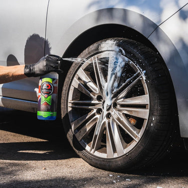 Acidic Wheel Cleaner being sprayed on a wheel