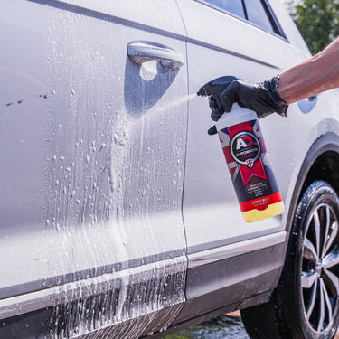 Citrus Wash being sprayed on a side of a car