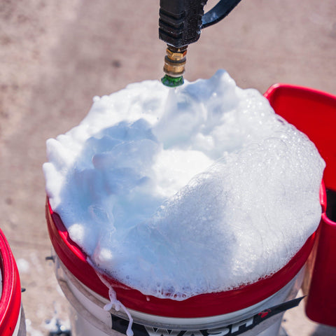 Bucket with foamy water 