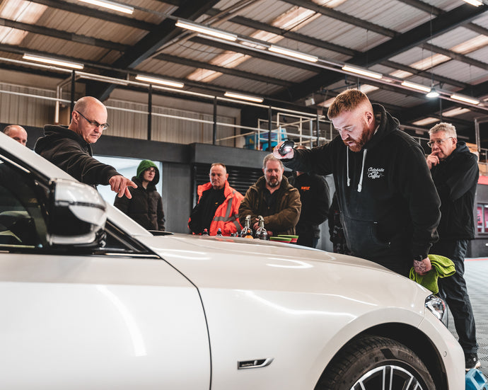 Mark and Clive teaching how to detail a car