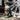 Bottle of wheel and tyre cleaner in front of a wheel